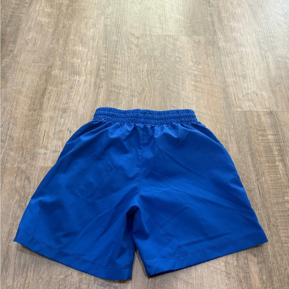 Nike Blue Performance Training Shorts with White Swoosh kids